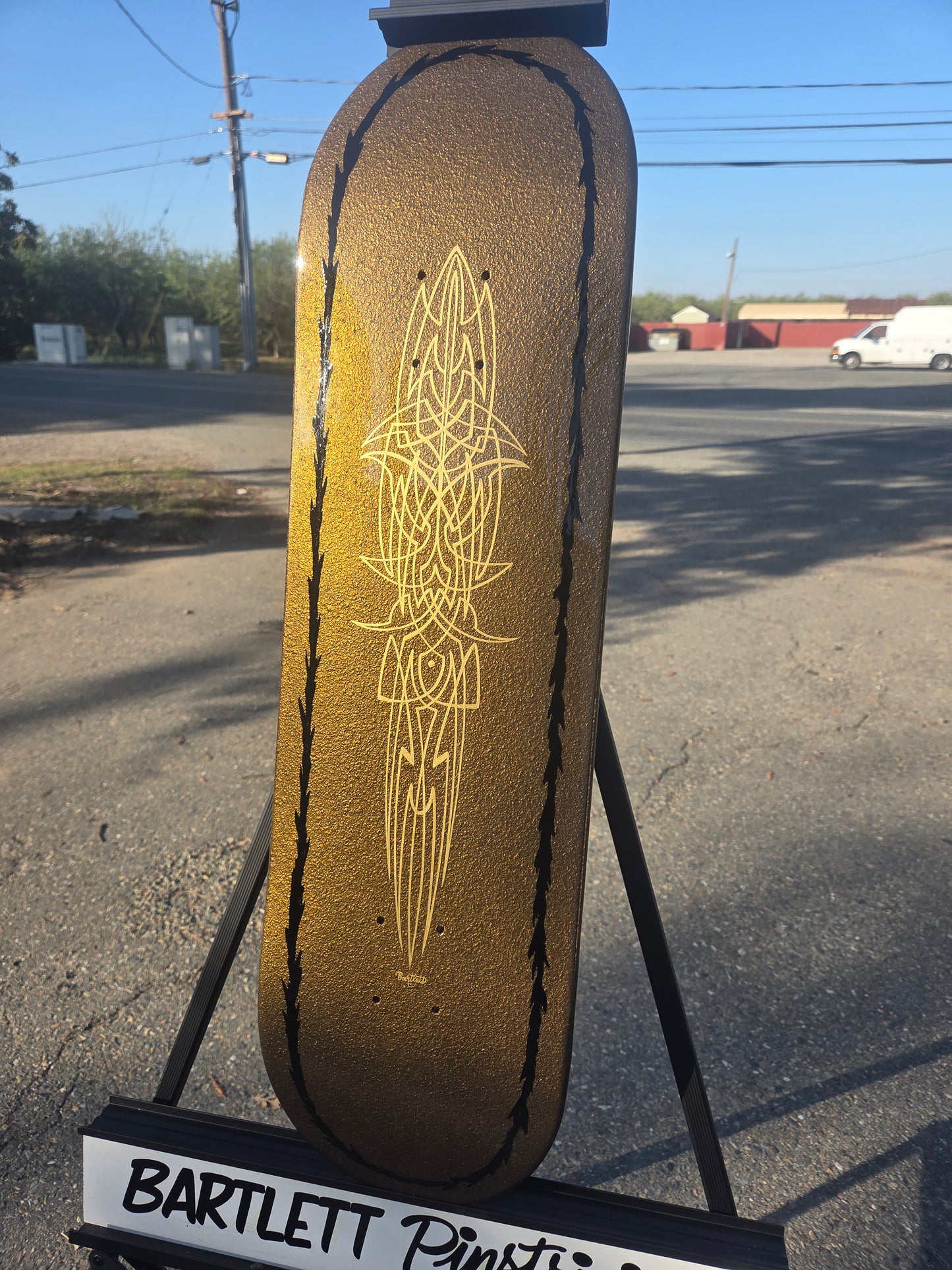 Gold pebble skate deck