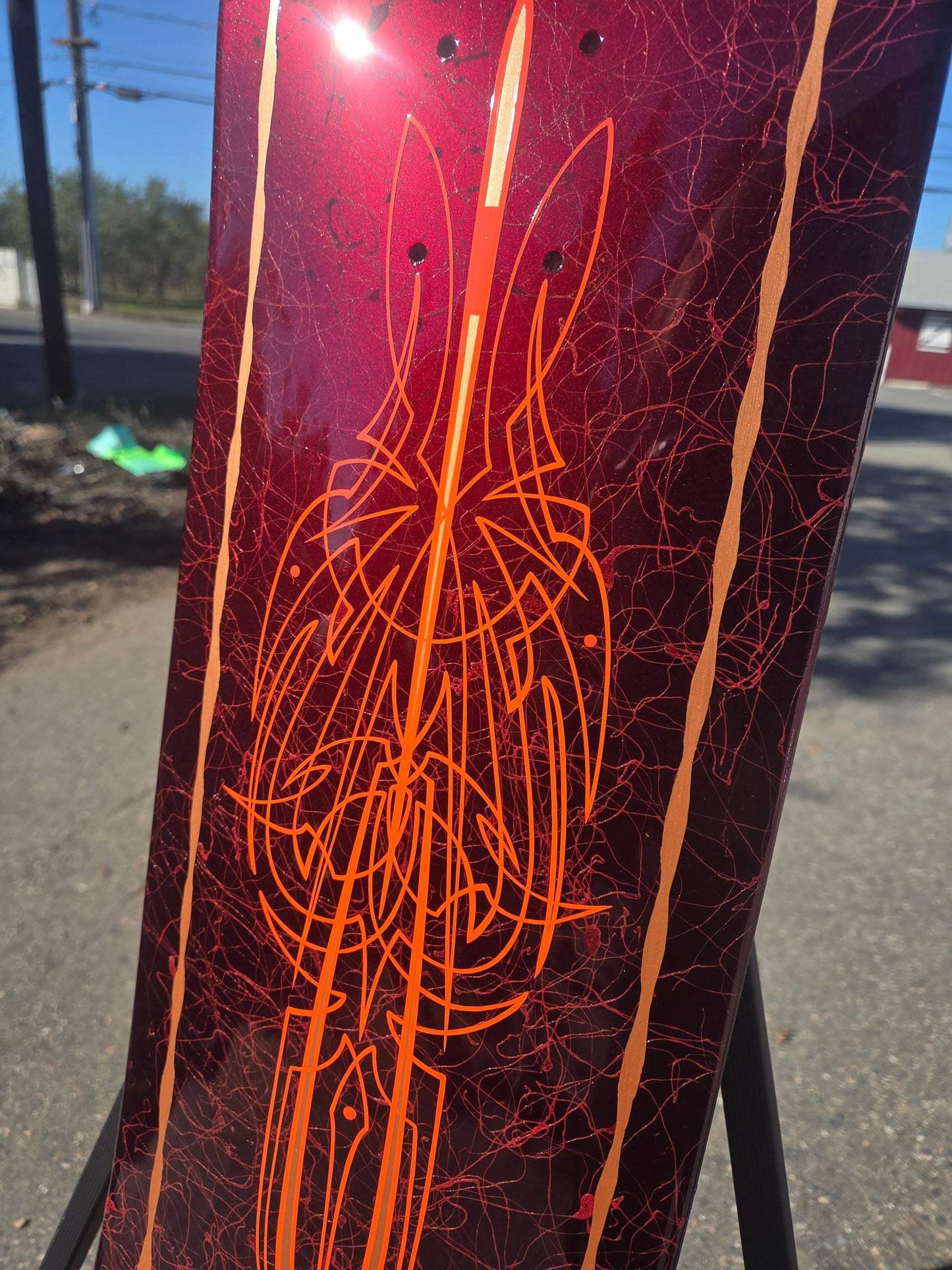 Red veiled skate deck