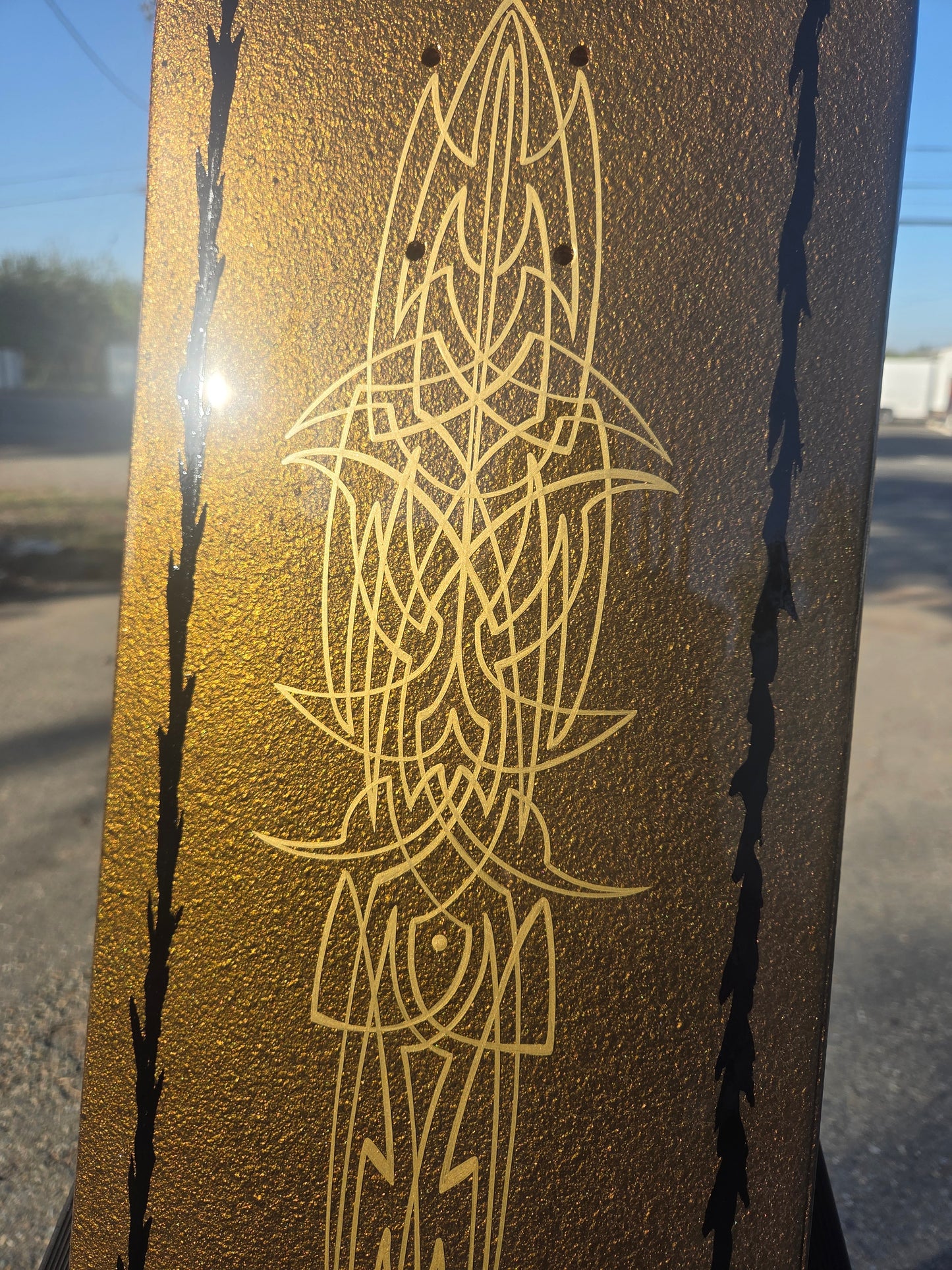Gold pebble skate deck