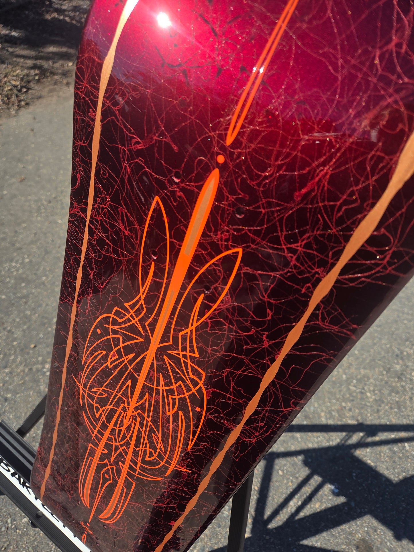 Red veiled skate deck