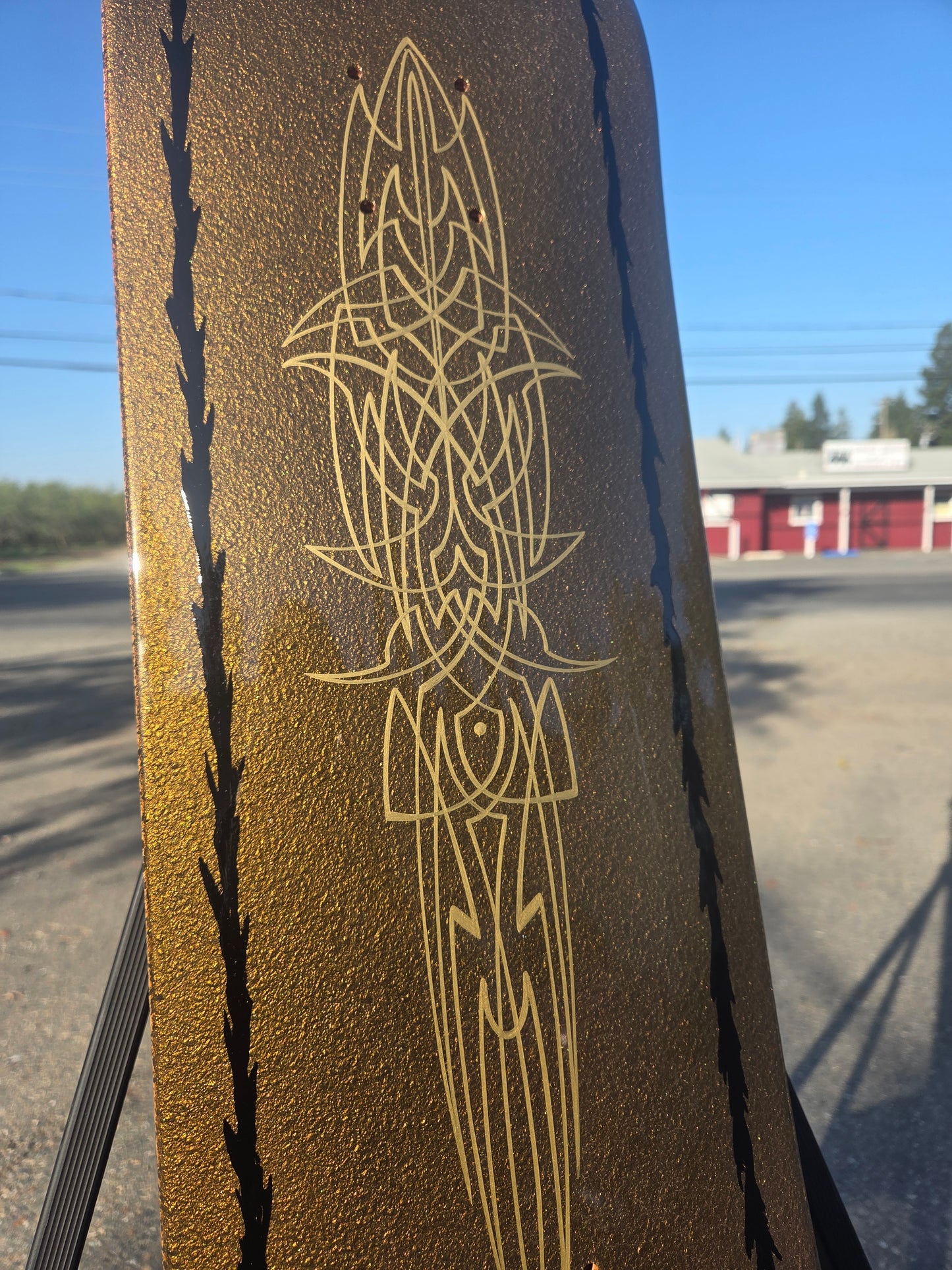 Gold pebble skate deck